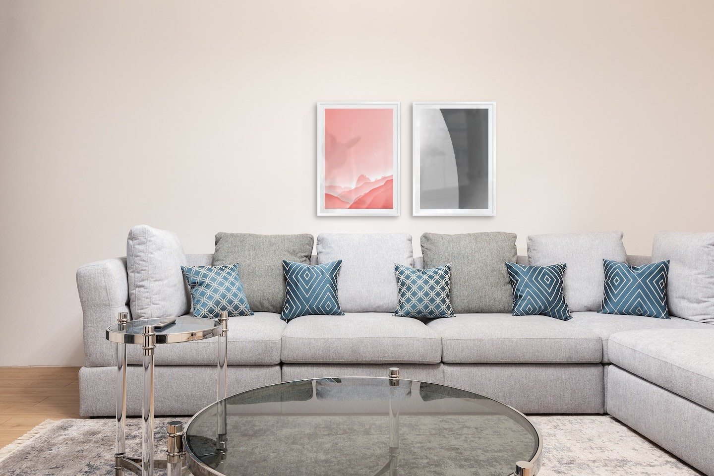 Gallery wall with picture frames in silver in sizes 50x70 with prints "Pink sky" and "Line"