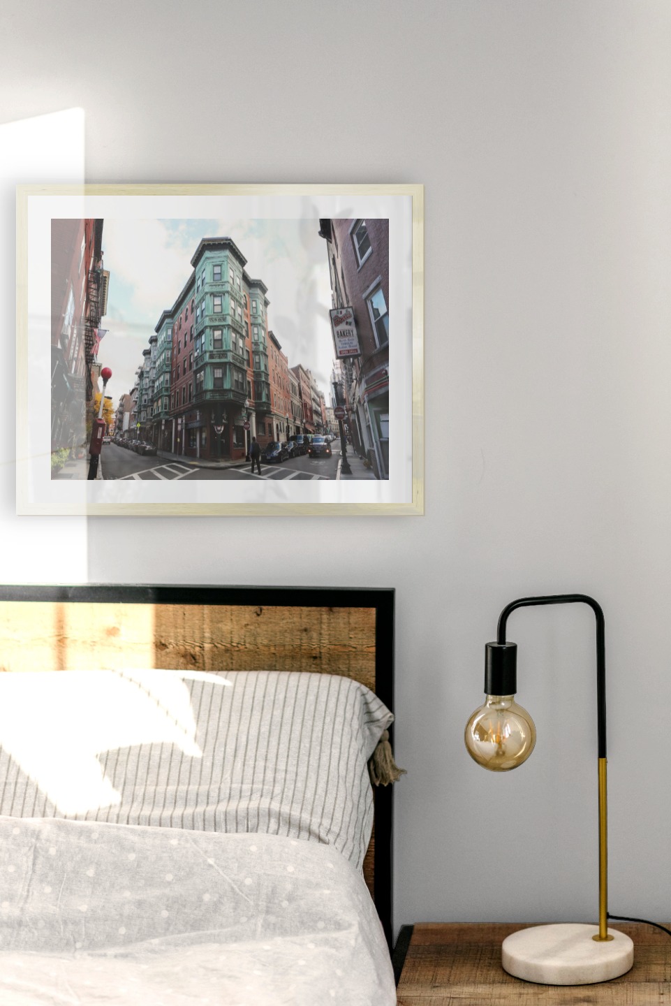 Gallery wall with picture frame in gold in size 40x50 with print "Street corner"