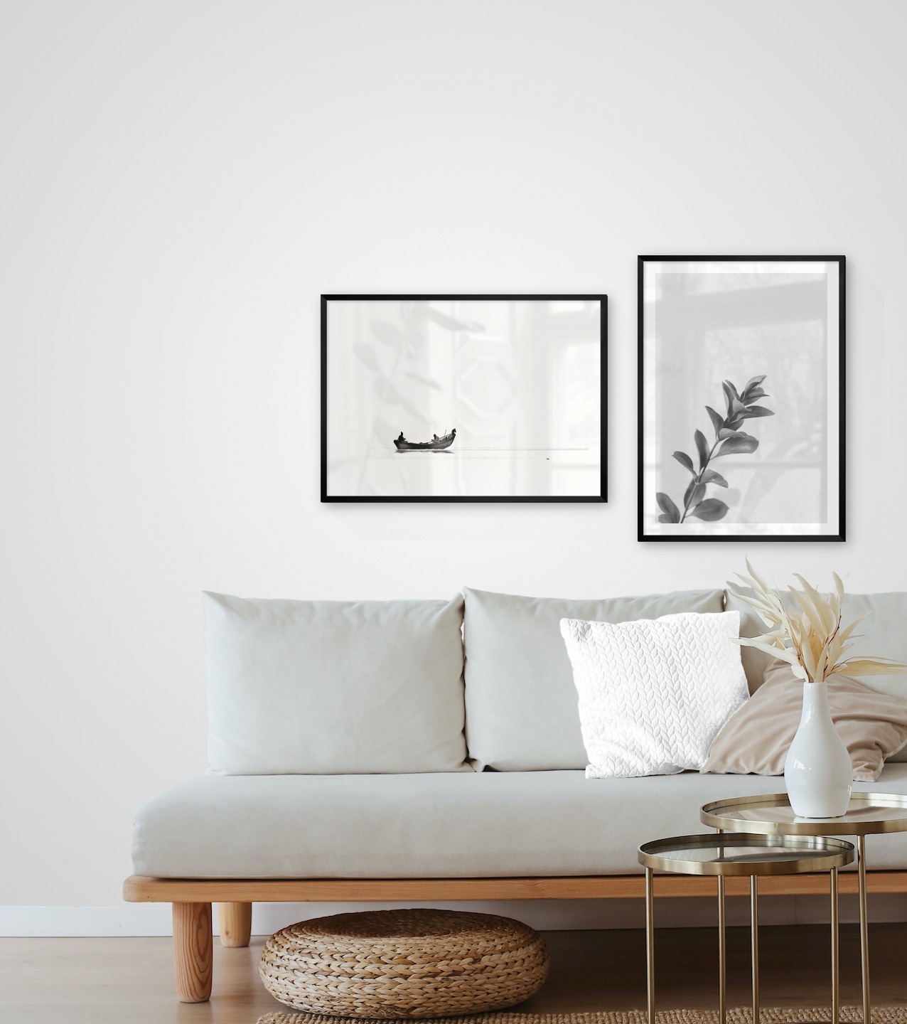 Gallery wall with picture frames in black in sizes 50x70 with prints "People in boat" and "Twig"
