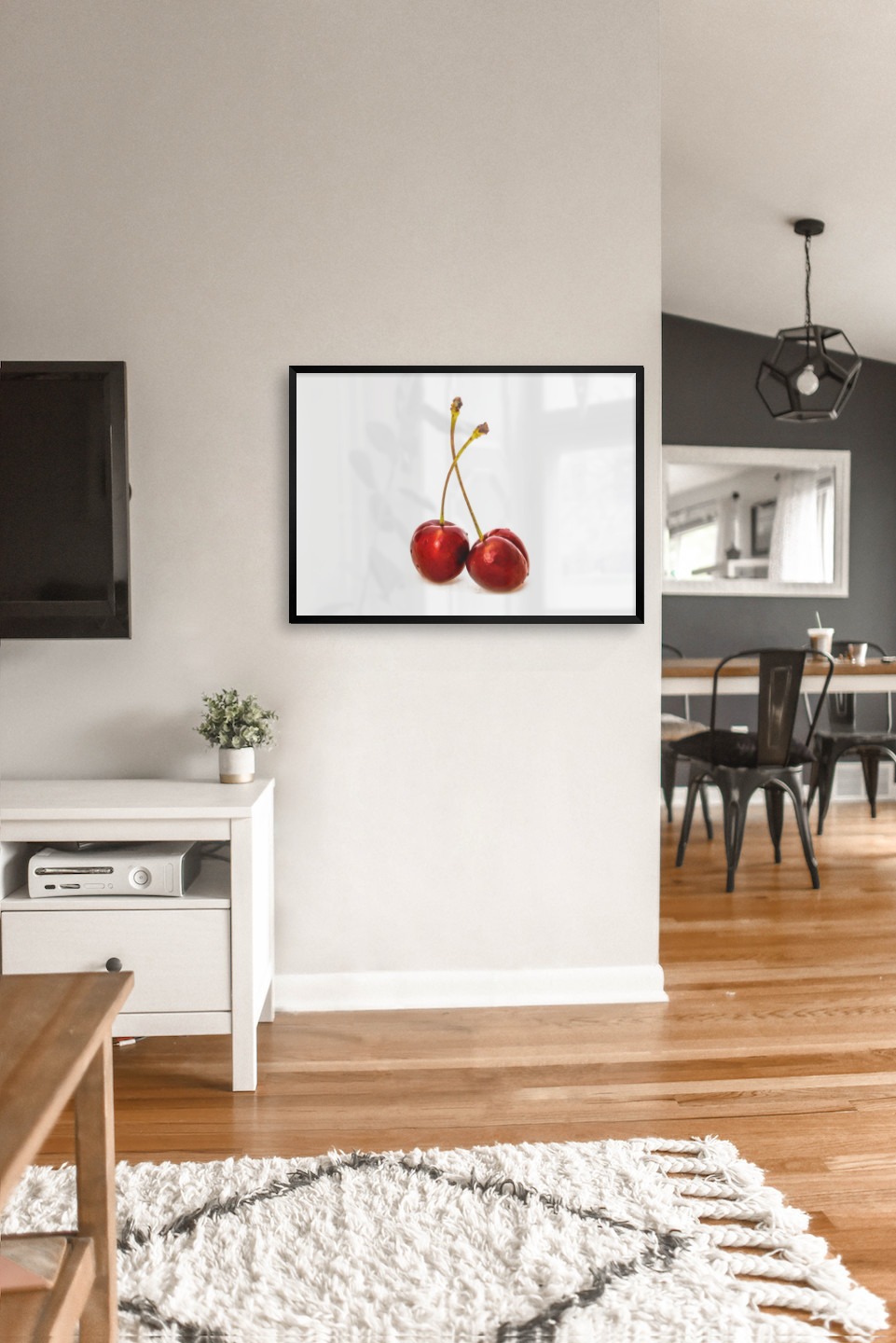 Gallery wall with picture frame in black in size 50x70 with print "Cherries with white background"