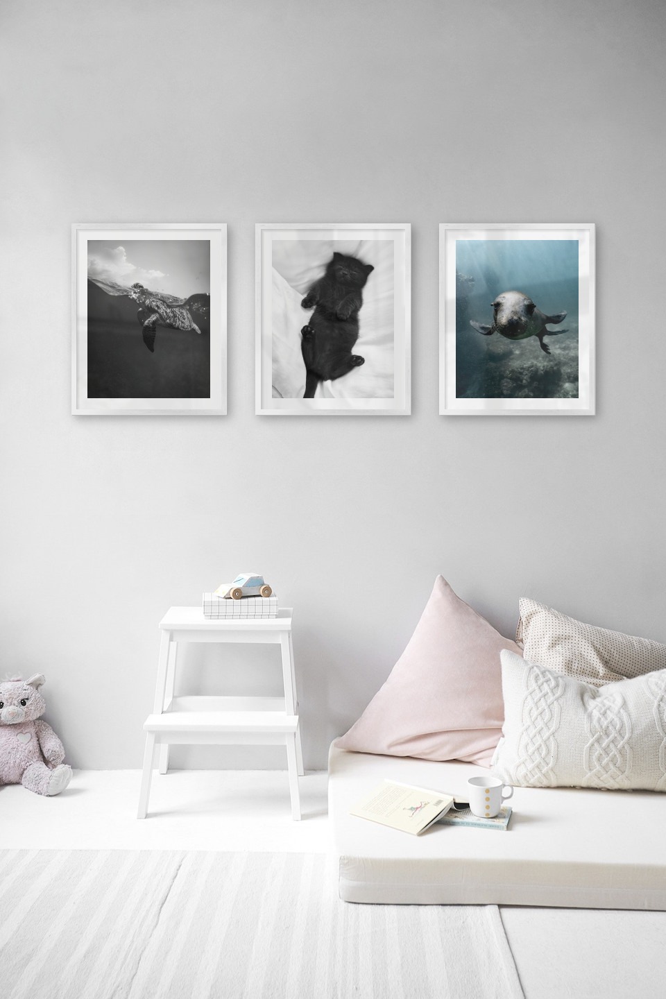 Gallery wall with picture frames in silver in sizes 40x50 with prints "Turtle", "Cat in bed" and "Seal in the water"