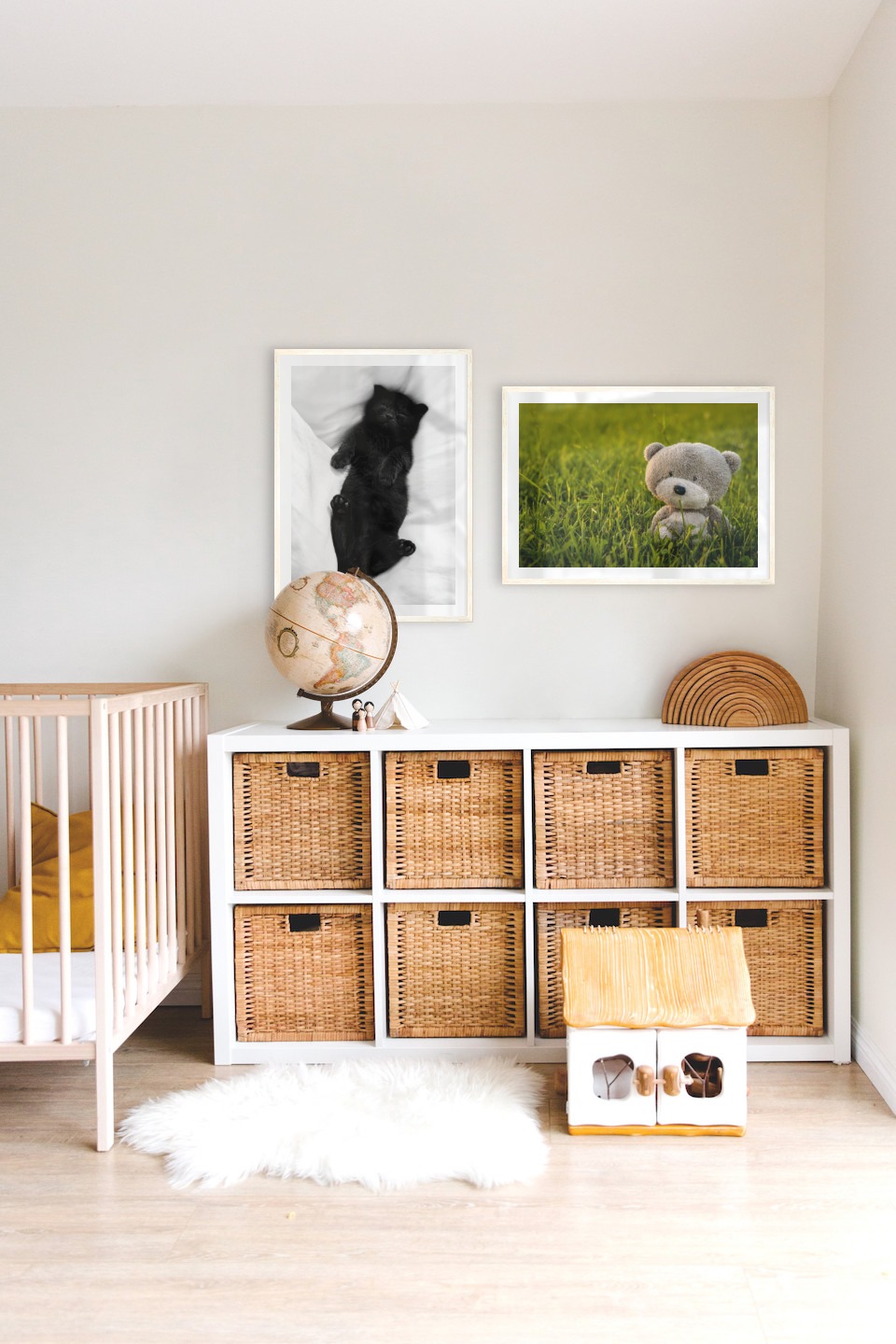 Gallery wall with picture frames in light wood in sizes 50x70 with prints "Cat in bed" and "Teddy bear in a field"