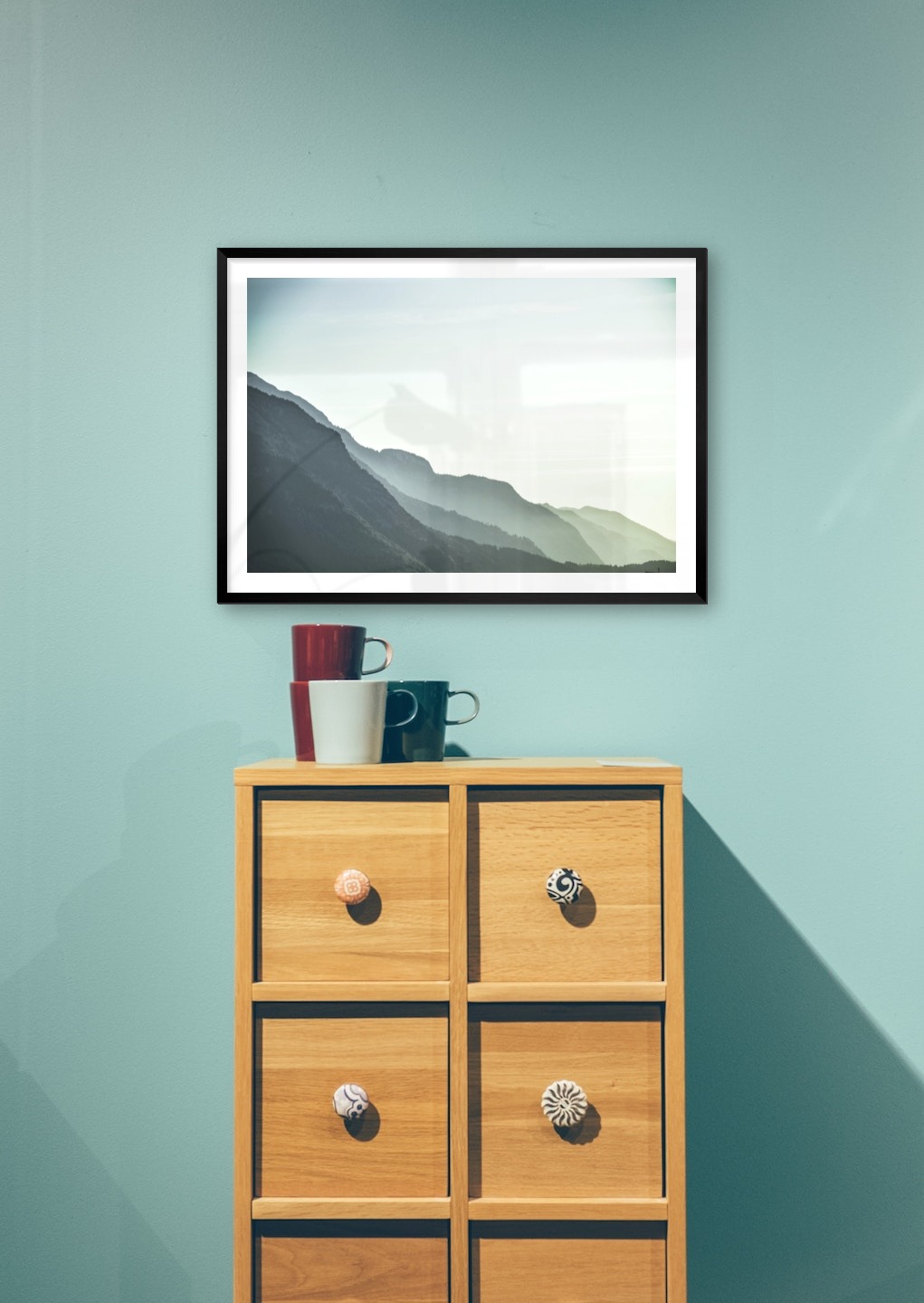 Gallery wall with picture frame in black in size 50x70 with print "Foggy mountain"