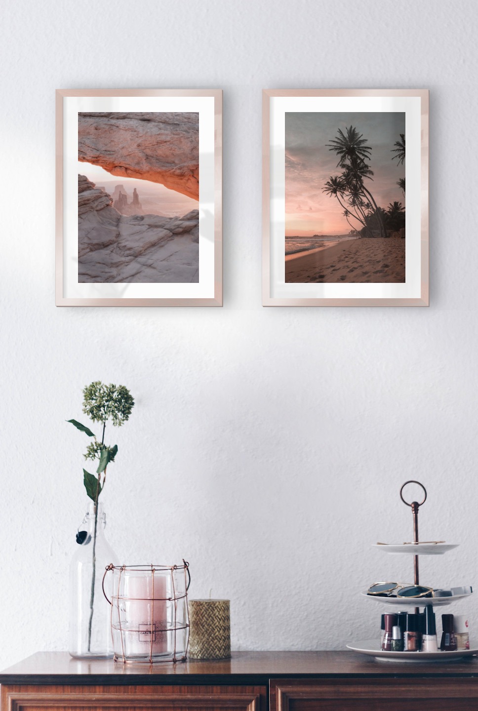 Gallery wall with picture frames in copper in sizes 30x40 with prints "View between cliffs" and "Beach at sunset"