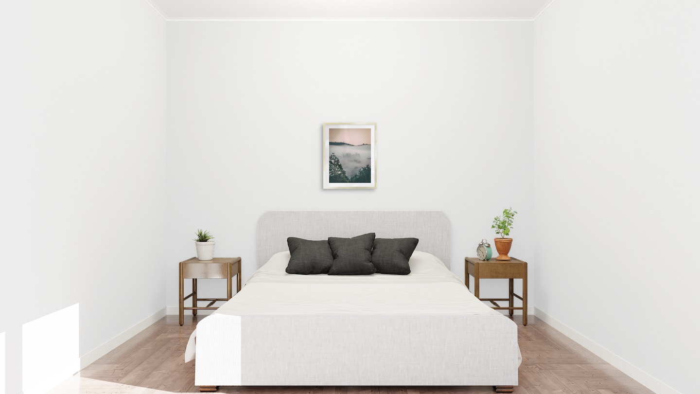 Gallery wall with picture frame in gold in size 40x50 with print "Wooden tops and orange sky"