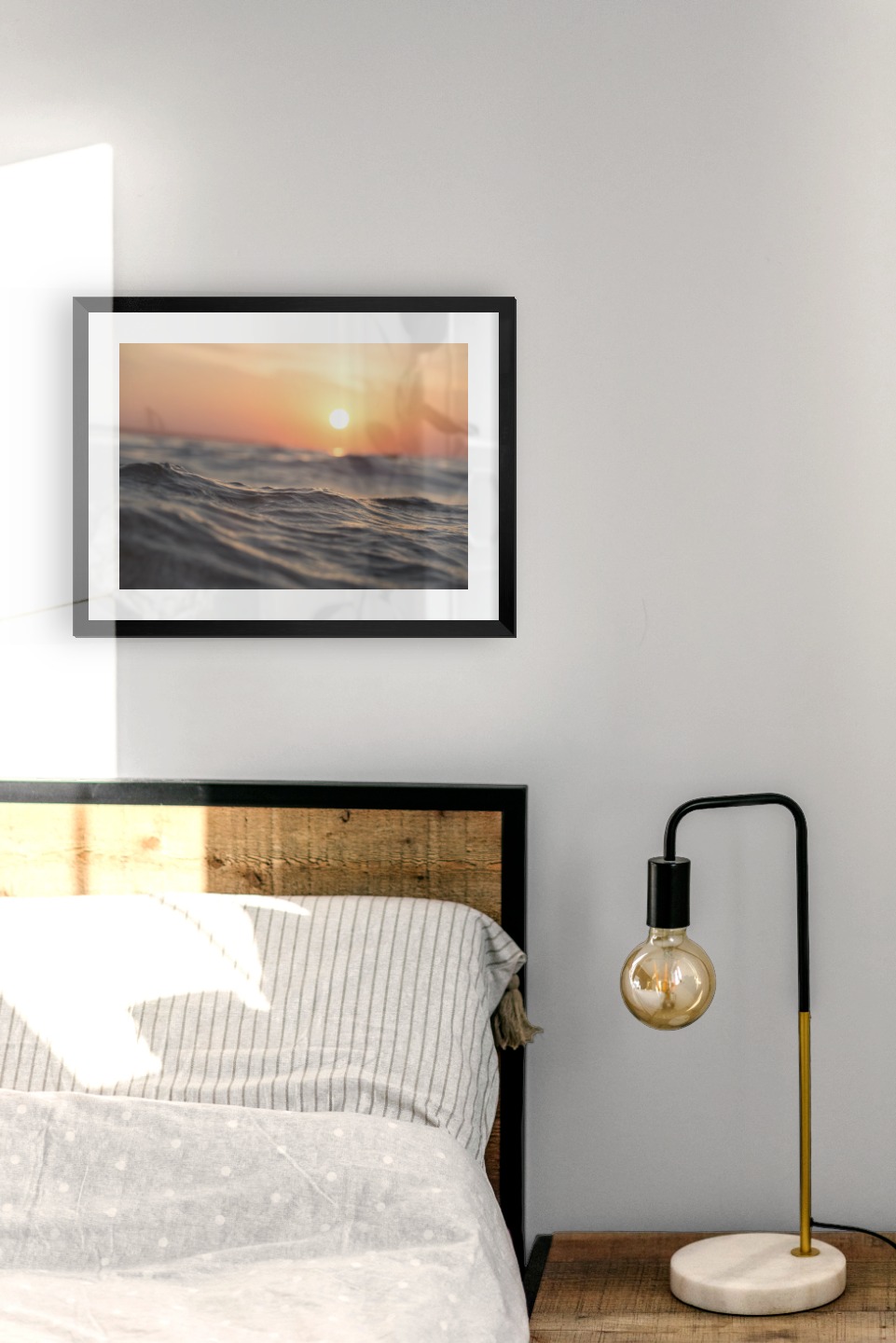 Gallery wall with picture frame in black in size 30x40 with print "Waves and the sun"