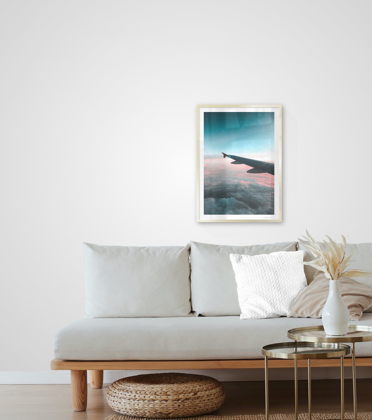 Gallery wall with picture frame in gold in size 50x70 with print "Above the clouds"