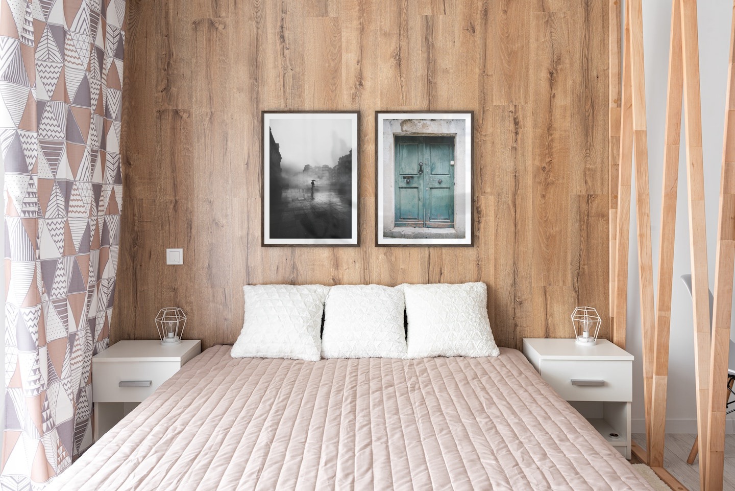 Gallery wall with picture frames in dark wood in sizes 50x70 with prints "Rainy city" and "Door"