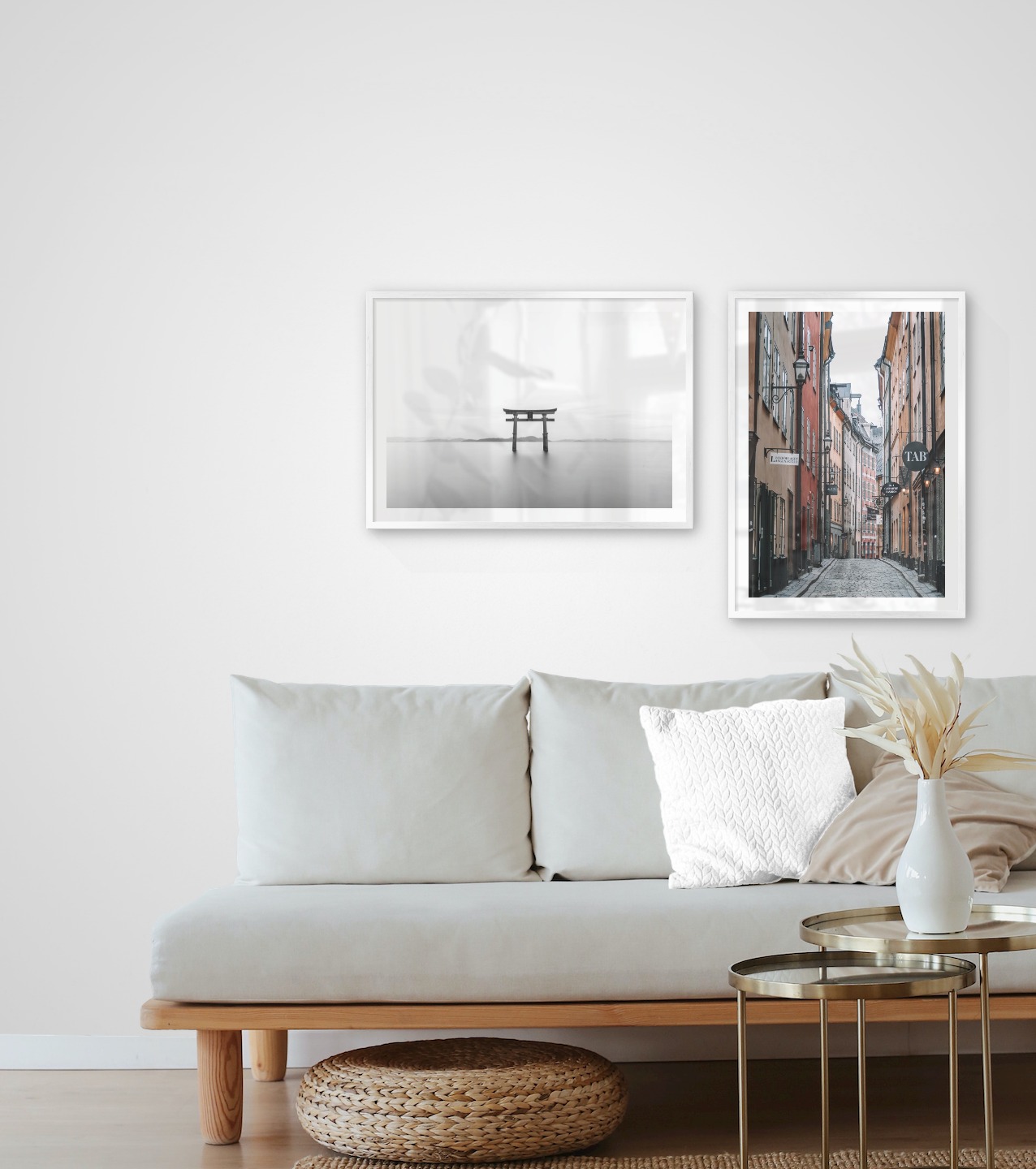 Gallery wall with picture frames in silver in sizes 50x70 with prints "Pillars in the water" and "Old town in Stockholm"