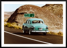 Gallery wall with picture frame in black in size 50x70 with print "Car on the road"
