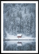 Gallery wall with picture frame in black in size 50x70 with print "Cottage by the lake"