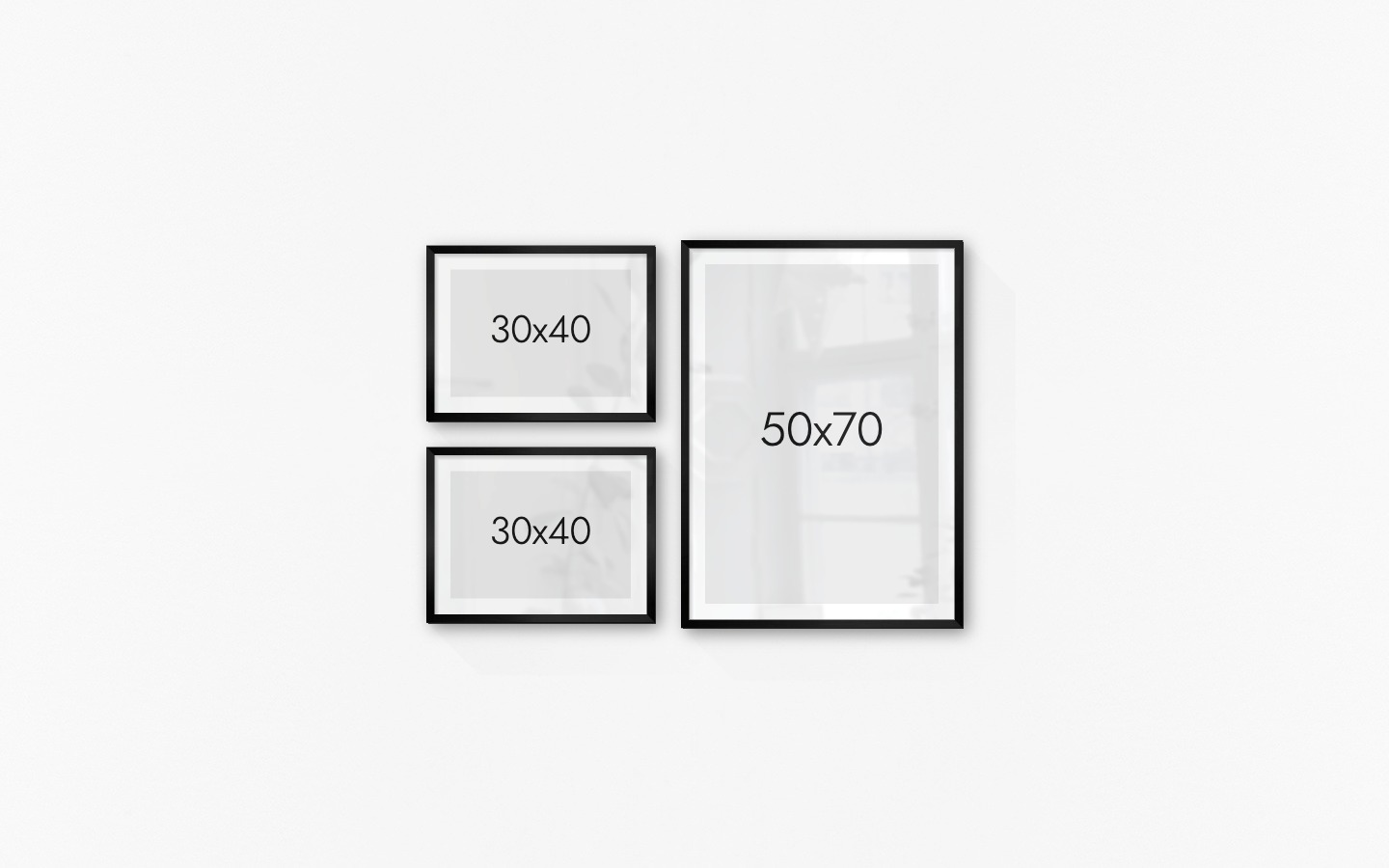 Gallery wall with picture frames in black in sizes 30x40 and 50x70