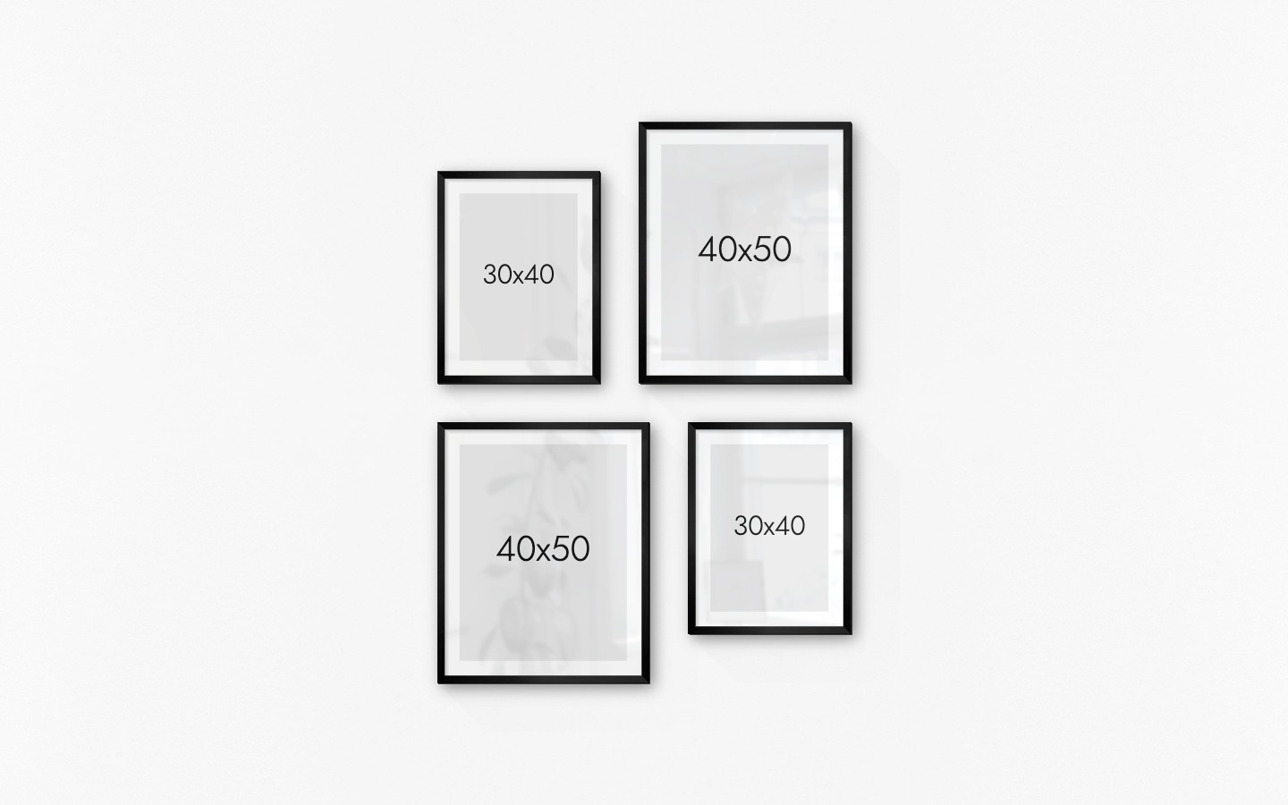 Gallery wall with picture frames in black in sizes 30x40 and 40x50