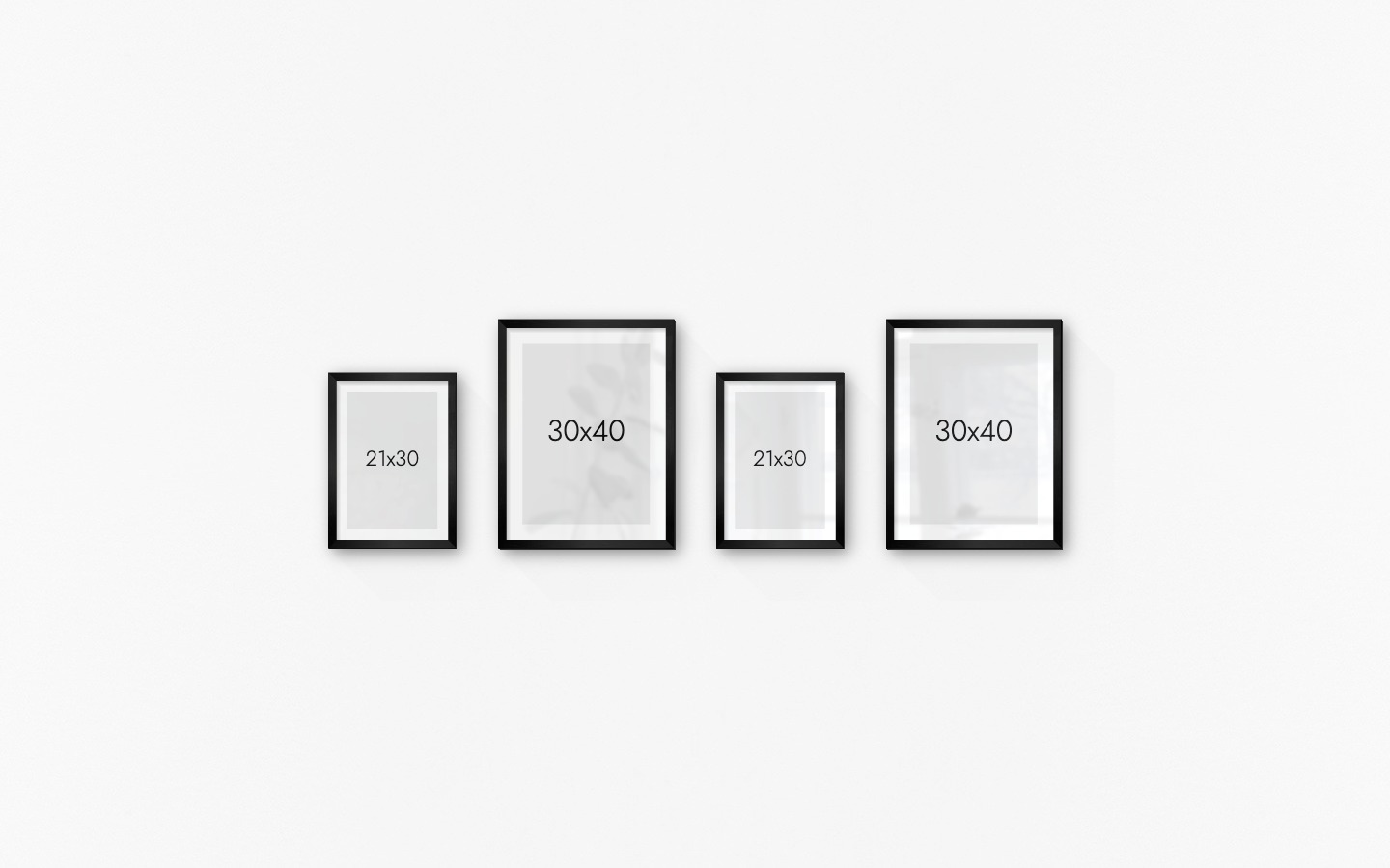 Gallery wall with picture frames in black in sizes 21x30 and 30x40