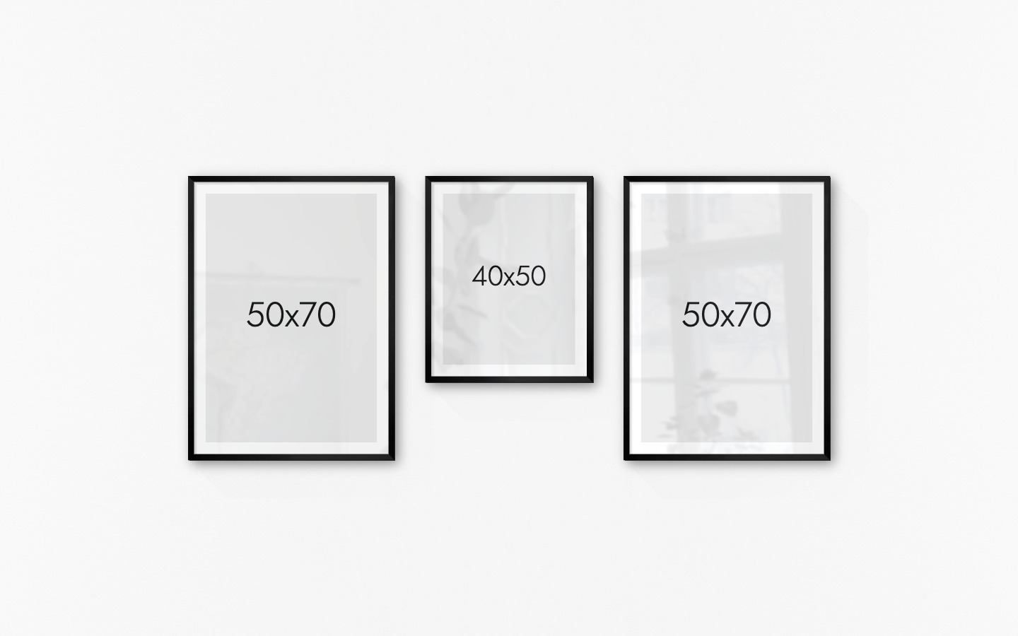 Gallery wall with picture frames in black in sizes 50x70 and 40x50