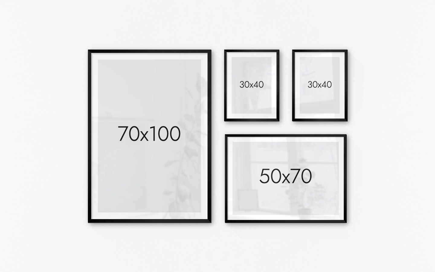 Gallery wall with picture frames in black in sizes 70x100, 30x40 and 50x70