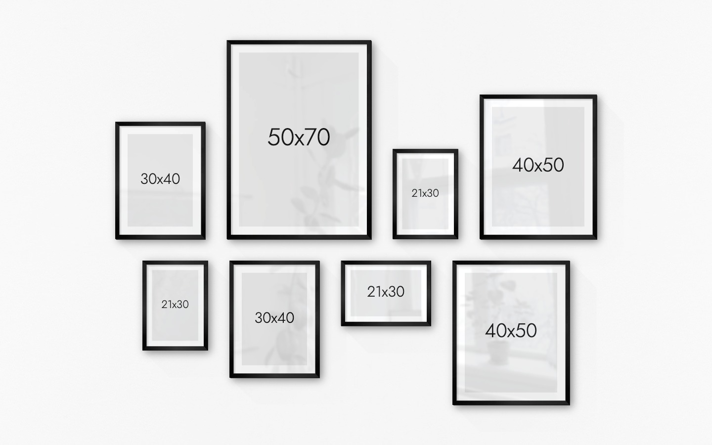 Gallery wall with picture frames in black in sizes 30x40, 50x70, 21x30 and 40x50